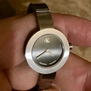 Vintage Calvin Klein Round Stainless Steel Watch with Black Dial